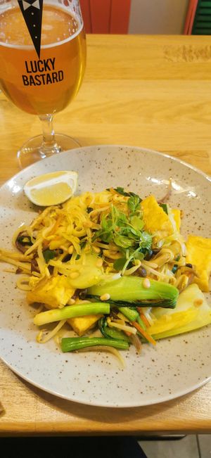Fried rice noodles with tofu mushrooms and pak choi at Bonjour Vietnam in Brno