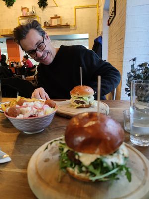 Happily receiving our burgers at Submarine in Rijeka