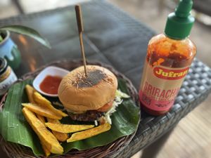 Vegan banana flower burger with Kamote fries   at Vegan Traveller's Corner in Salvador Benedicto