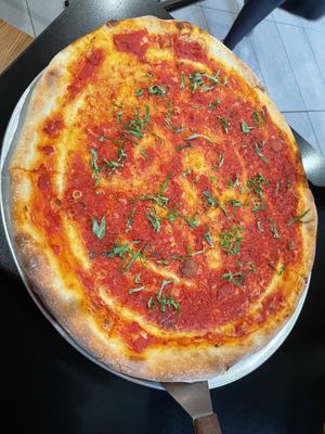 Large vegan pie with just tomato and basil and garlic   at Alfie's in Rocky Point