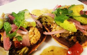 Vegan Tostados with Chipotle Black Beans  Farmers Veggies, Salsa Verde, Avocado, etc at Three Bird Cafe in Eureka Springs