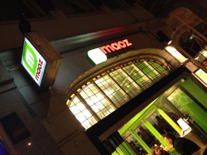 outside at night  at Maoz - Damrak in Amsterdam