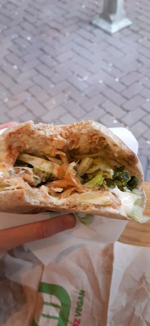 already took a bite but gawd dayum the chilli sauce at Maoz - Damrak in Amsterdam