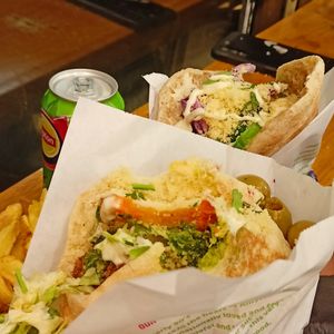 Hummus falafel pita & mushroom pita at Maoz - Damrak in Amsterdam