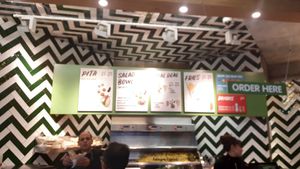  at Maoz - Damrak in Amsterdam