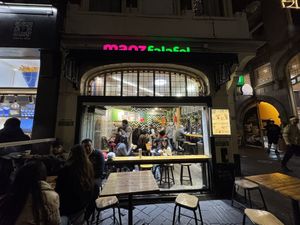 You can sit outside   at Maoz - Damrak in Amsterdam