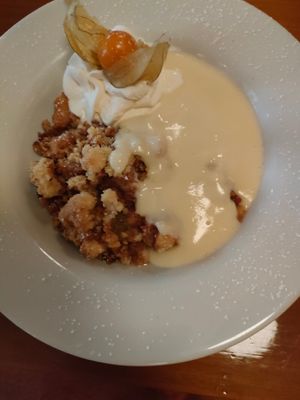 Rubarb and strawberry crumble with custard at Bricín Restaurant and Boxty House in Killarney