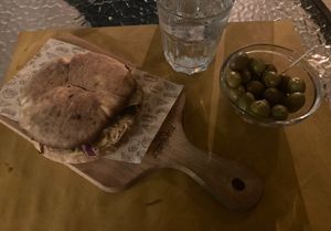 Vegan Apulian Puccia. Soya meat, sun dried tomatos, hummus, red onion, kale, broccoli.   at La Bitta 2 in Bari