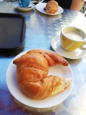 Croissant & coffee with oat milk at CroisSants in Barcelona
