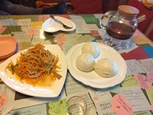 Salad and bao zi dumplings at Nalan Tuo - 娜兰陀素食馆 in Xining