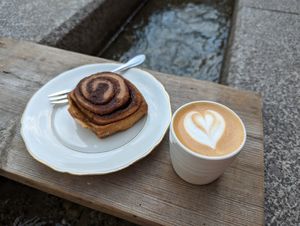 Cappuccino and cinnamon roll at Bächle in Freiburg