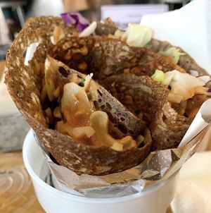 vegan thai crepe with cabbage, cilantro, cashews, peanut sauce in a buckwheat crepe  at Crepes Paulette in Bentonville