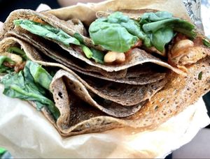 la vegan crepe with spinach, french fried onions, salsa, and added cashews  at Crepes Paulette in Bentonville