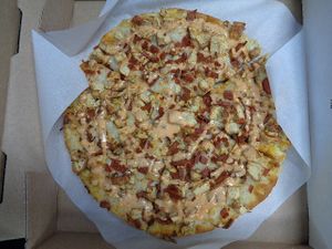 Signature Vegan Baked Buffalo on round/traditional crust, minus onions per my request. Size small, but it was very filling with its thicker crust and generous cheese. at Primoz Pizzeria in Mentor