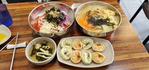 Spicy noodles, Traditional Korean noodles, and the vegetable dumplings at Daom Noodle 다옴국수 in Seoul