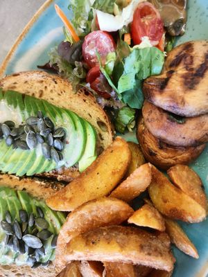 Avocado toast with hash brown mushrooms and potatoes at Cafe Central in Ayia Napa