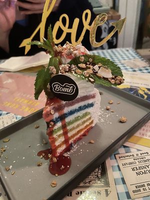 Rainbow bomb cake! All vegan and so good!!!!  at Veggie4Love in Hong Kong Island