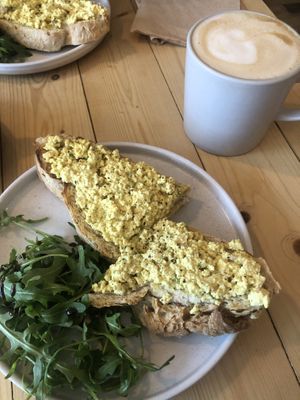 Tofu scrambled and latte  at Taylor's Cafe in Brussels