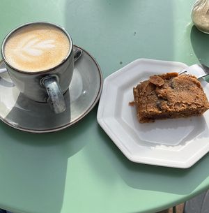 Cappuccino with blondie brownie  at Taylor's Cafe in Brussels