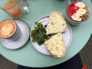 Flat white, savoury toast, breakfast pot at Taylor's Cafe in Brussels