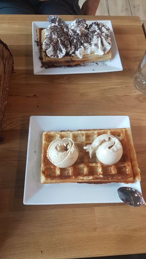 Waffle with ice cream + waffle with whipped cream and chocolate at Lody Daktyl Cafe in Gdansk
