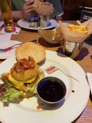 Moving Mountains burger with some of the tomato from the bruschetta in  at Hard Rock Cafe in Ayia Napa