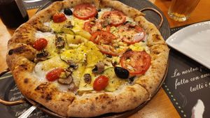 Half marguerita and half zuchini With mushroons at Don Diovani in Balneario Picarras