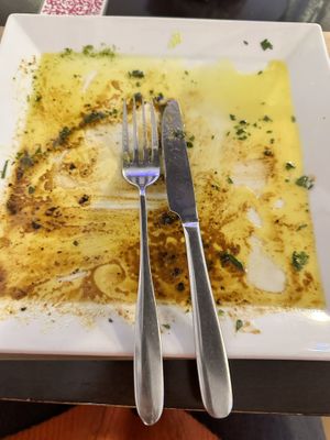 The tasteless oil that was left behind after I finished.   at Vegetariano El Calafate in Malaga