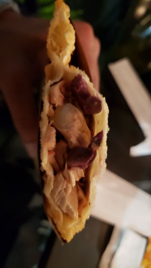 Interior of pastel de frango e azeitona (R$14). Super tasty. at Miraflores - Gastro Bar Vegan  in Curitiba