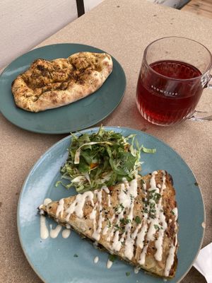 Spanakopita, iced tea and zatar bread  at Gaia Kitchen in Vienna