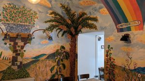Inside murals at Gaia Kitchen in Vienna