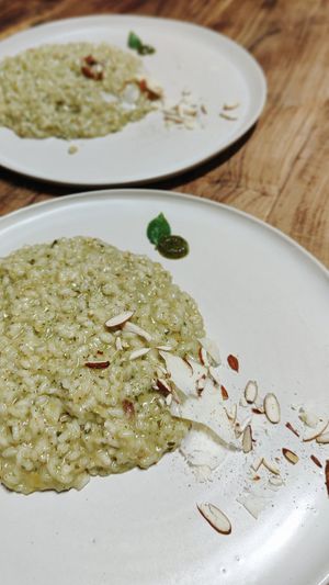 Vegetarian risotto with local and artisan cheese, pesto and almonds. at Casa Rural Cal Calsot in Montella