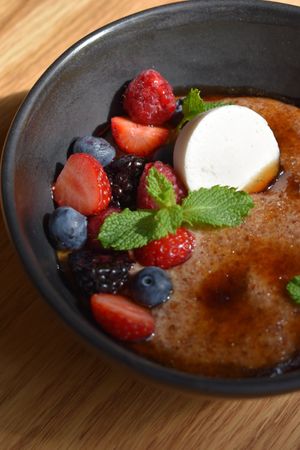 Flax seeds porridge with berries and ice cream at Steppe Healthy and Vegan Bakery, in Lviv