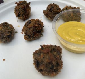 Mushroom nuggets served with mustard.   at Secret Vegan Cafe in Kingston