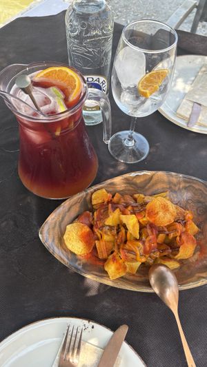 Patatas bravas y sangria   at MariBel Arrocería in Valencia