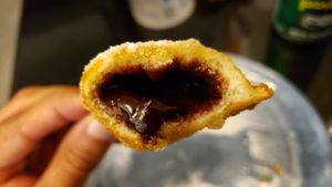 Interior of chocolate ganache pocket. Tasty. at Animalchef Ásia Pinheiros in Sao Paulo