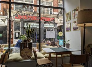 Inside with the outside seating through the window at Bryter Moon Deli in Leicester