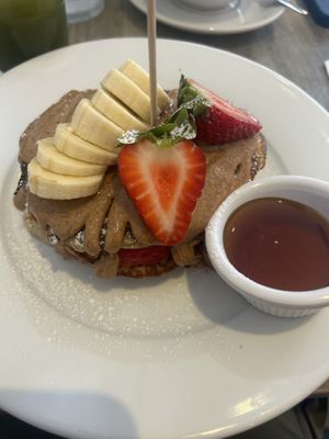 Pancakes with almond butter, strawberry, banana and maple syrupp  at Pog  in Malahide