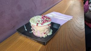 Vegan crumble with apple fruit. Almonds and petals as the topping at Humble Crumble in South East London