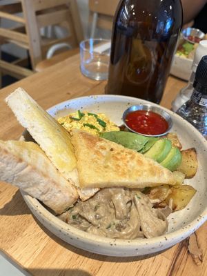 Gluten free bread, awesome cheese, avocado, potatoes, tofu scrambled, cashew mushrooms   at Bakers & Roasters in Amsterdam