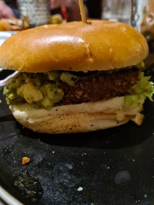 Mother clucker burger with smashed avocado at Turtle Bay  in Durham
