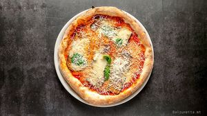 Pizza Parmigiana at Balzunetta Restaurant in Floriana