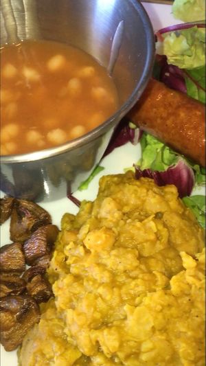 Bfast; chickpea scramble, baked beans, vegan sausage, mushrooms, salad and toast  at Balzunetta Restaurant in Floriana