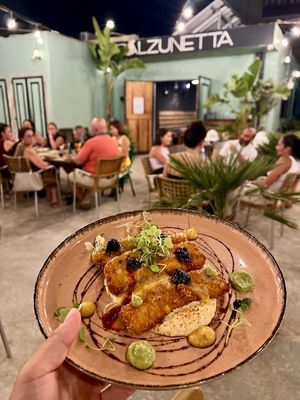Vegan Main: Tofu Steak
200 grams of overnight marinated tofu steak, breaded and served on a base of hummus. Garnished with micro herbs, raddish and our homemade blackberry sauce at Balzunetta Restaurant in Floriana