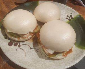 bao buns with marinated tofu, marinated cucumbers, red onion, spring onions, peanuts, wasabi mayo at Woosabi in Gdansk