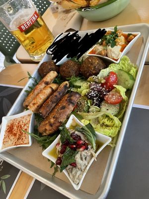 Amazing veggie platter. I (vegan) and my bf (veggie) had a great time here. V knowledgable and put dairy n cheese (scribbled out) on side which my bf could eat but I could avoid.   at EATERY in Athens