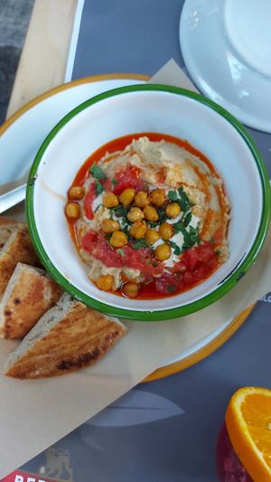 Hummus platter (LOTS of hummus) with a warm pita at EATERY in Athens