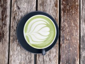 Matcha latte with oat milk; beautiful latte art    at The Milkman in Edinburgh