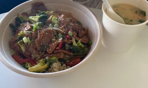 Pepper steak bowl (soy protein, bell peppers, broccoli, brown rice, green onions, teriyaki sauce) and potato soup (carrot, celery, onion, kale, three types of potato) at Loving Hut in Reynoldsburg