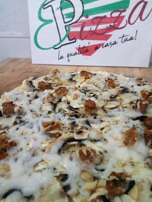 Sausage pizza at EPizza Vegan in Rome